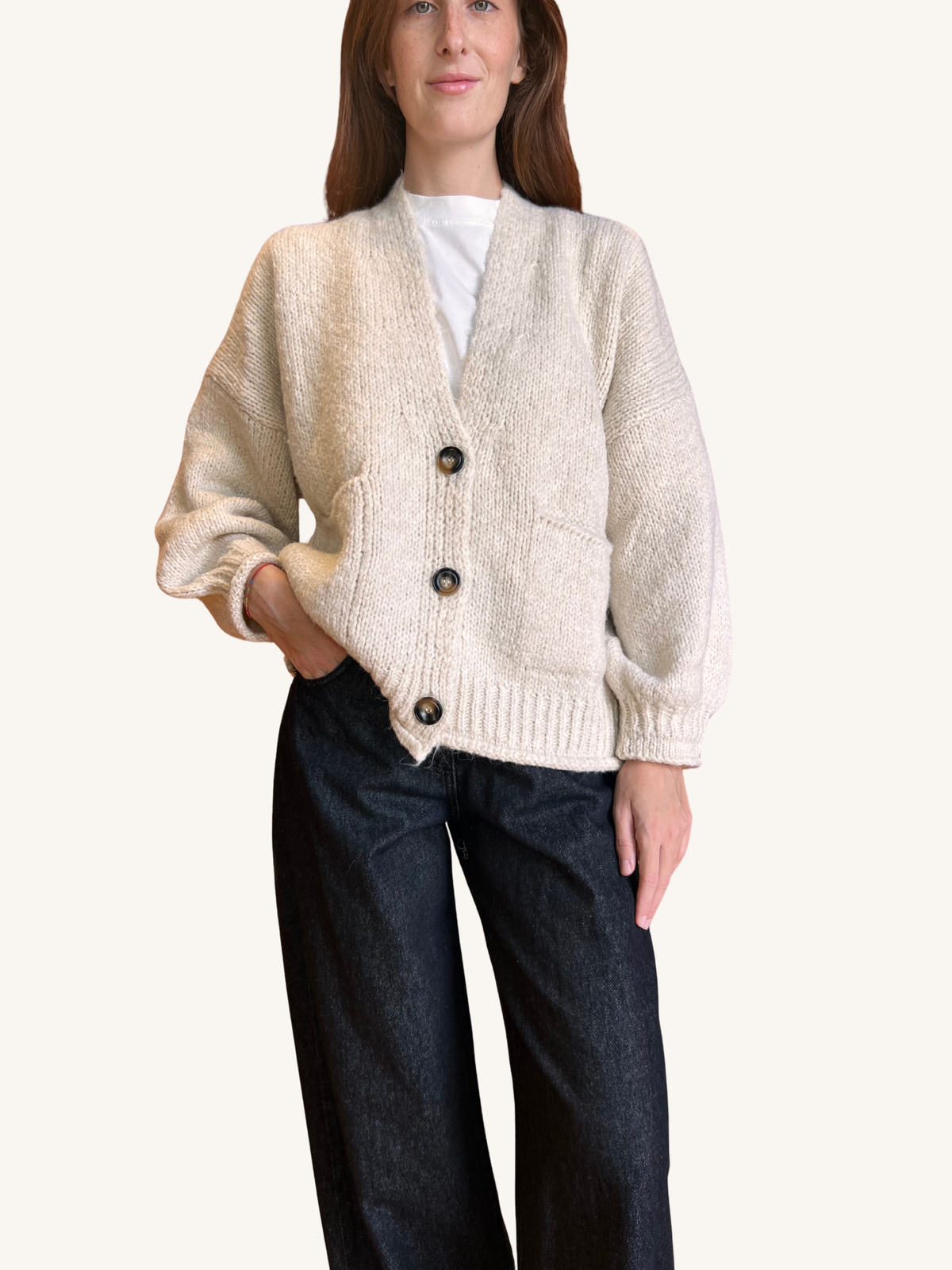 CARDIGAN CON TASCHE CALCE